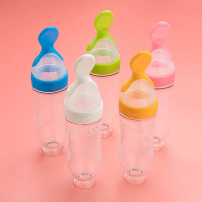 Cuchara alimentadora y biberón de entrenamiento de silicona para bebés